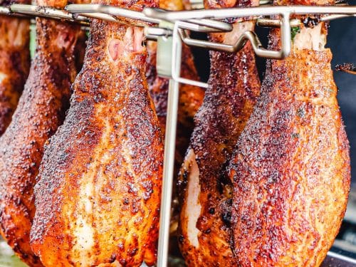 https://www.grillseeker.com/wp-content/uploads/2018/07/chicken-drumsticks-smoking-on-rack-500x375.jpg