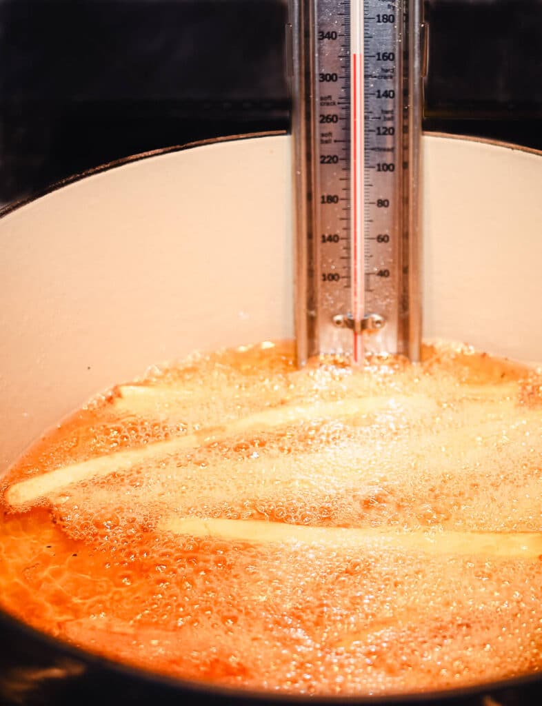 french fries frying in oil