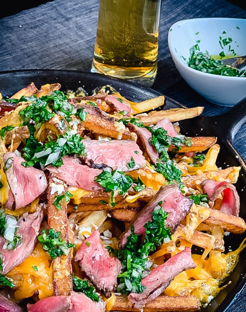 steak frachos with chimichurri and beer