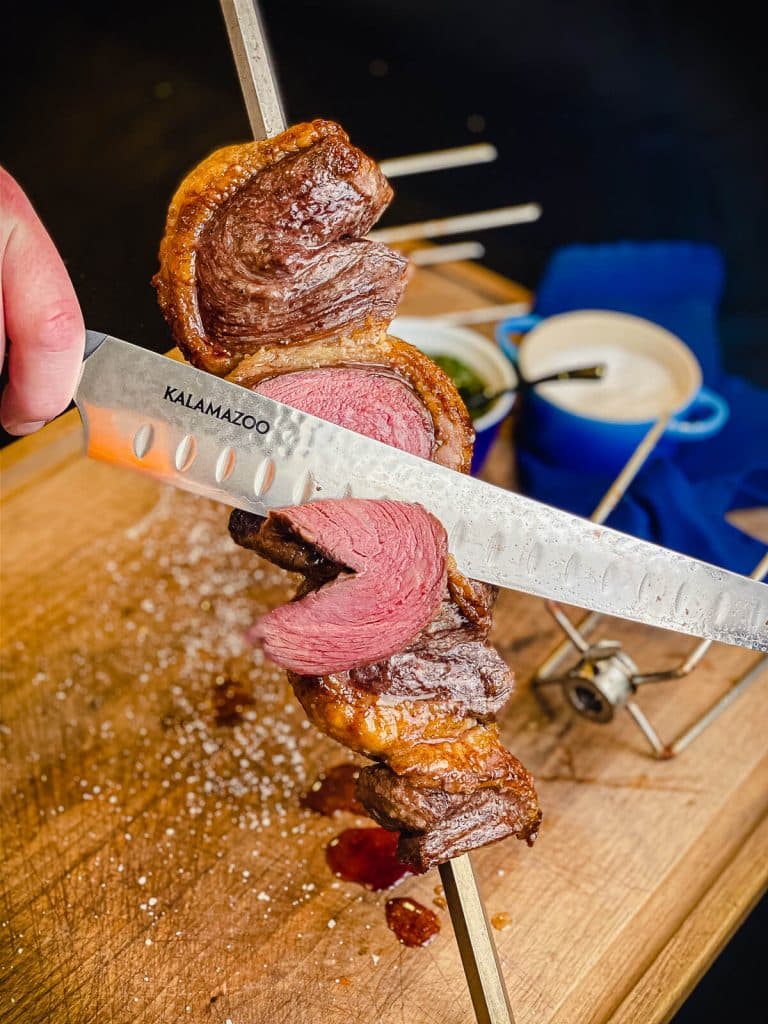 Premium PSD  Steak rotisserie at the steakhouse sliced picanha picanha