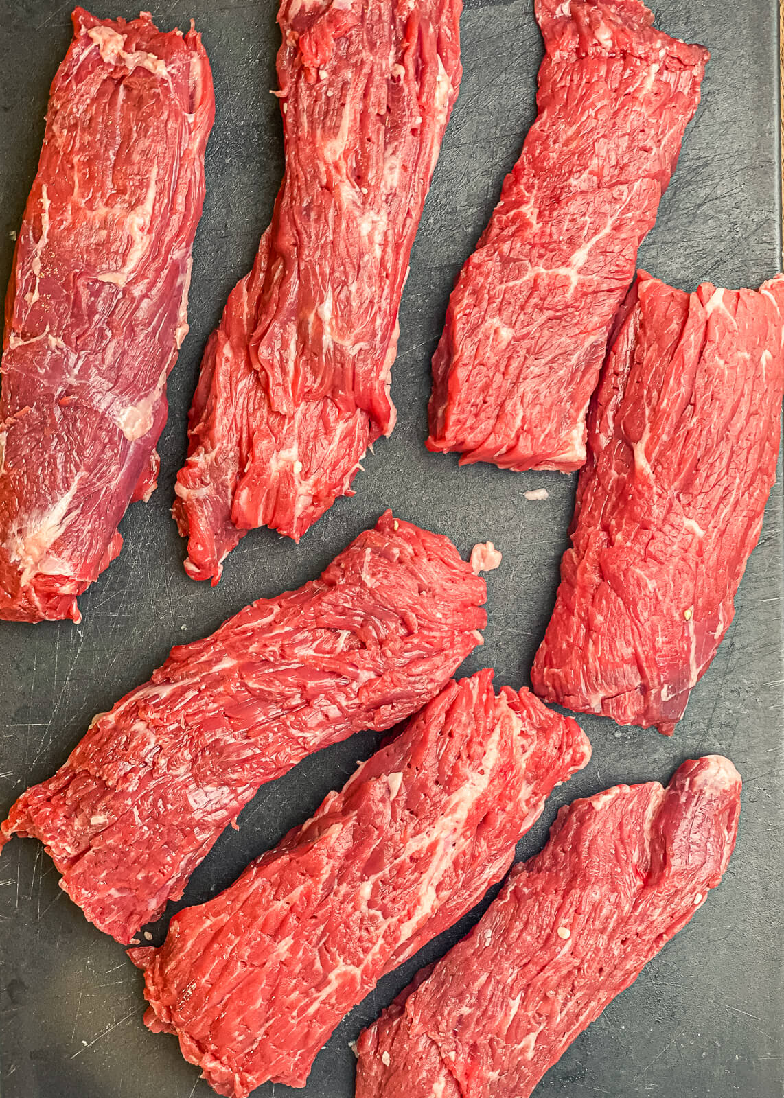 How To Cook Flap Steak Grillseeker   Uncooked Flap Steaks On A Cutting Board 