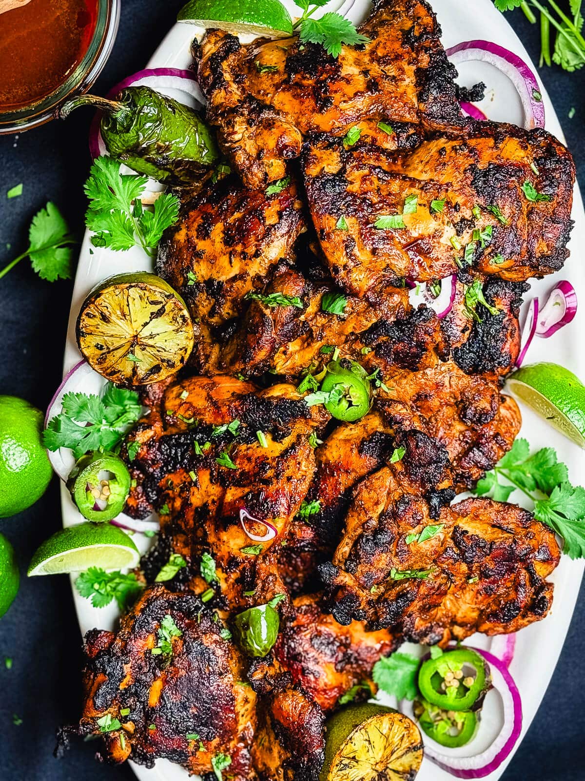 platter of grilled chipotle chicken thighs