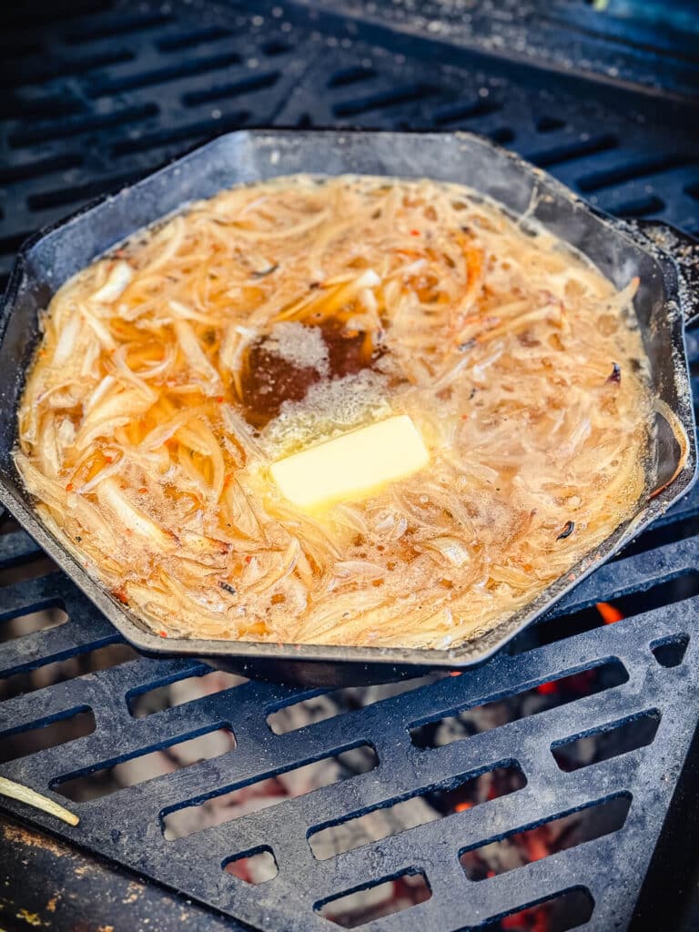 cast iron pan with onions and butter