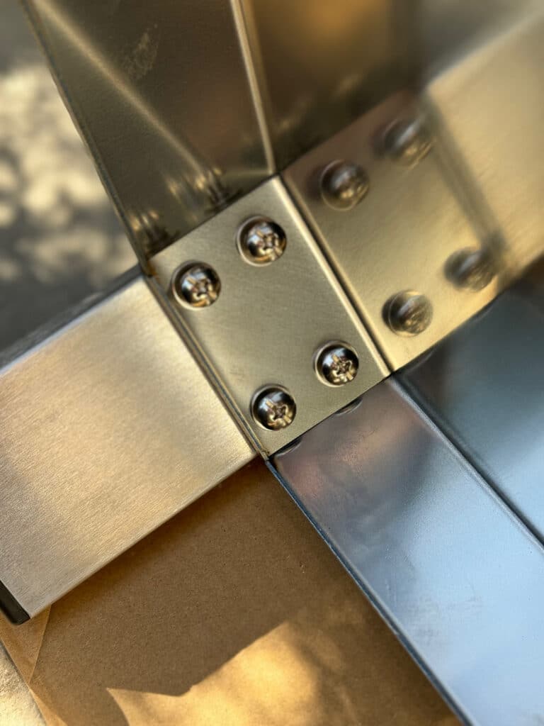 screws holding a grill together