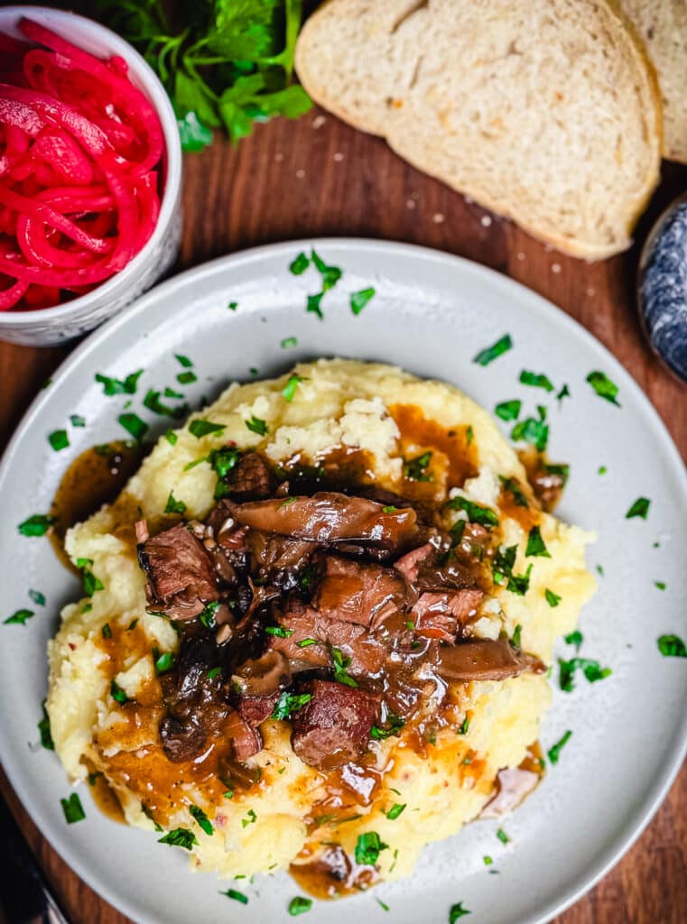 slow cooker beef tips topping mashed potatoes