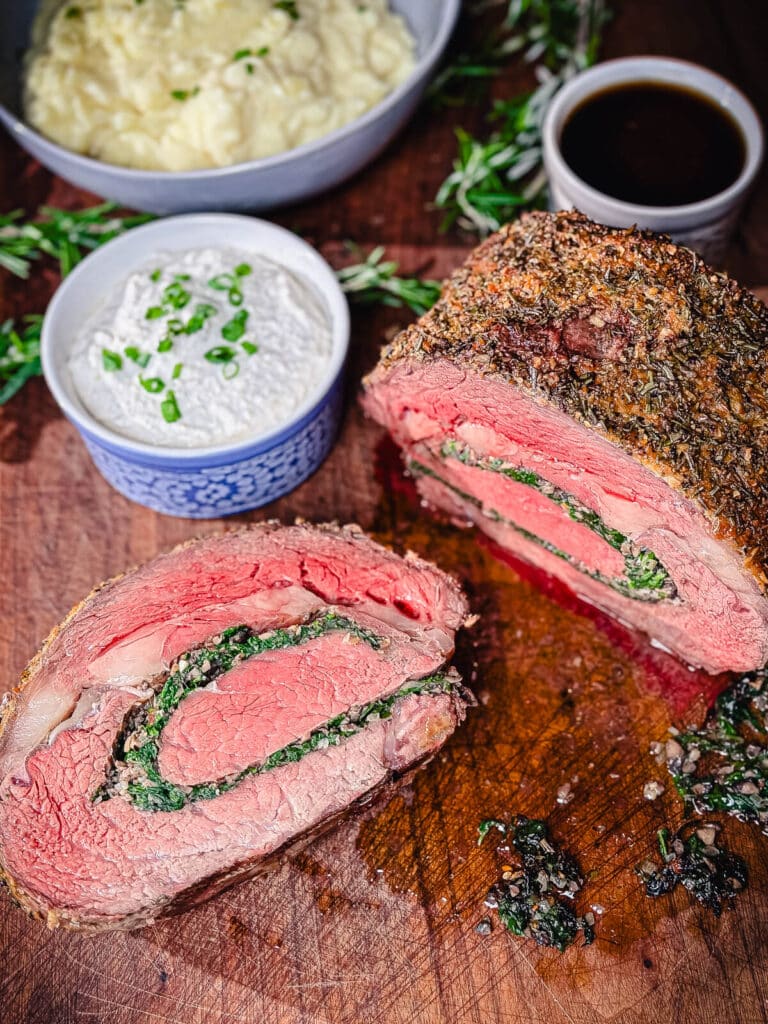 stuffed prime rib on a cutting board