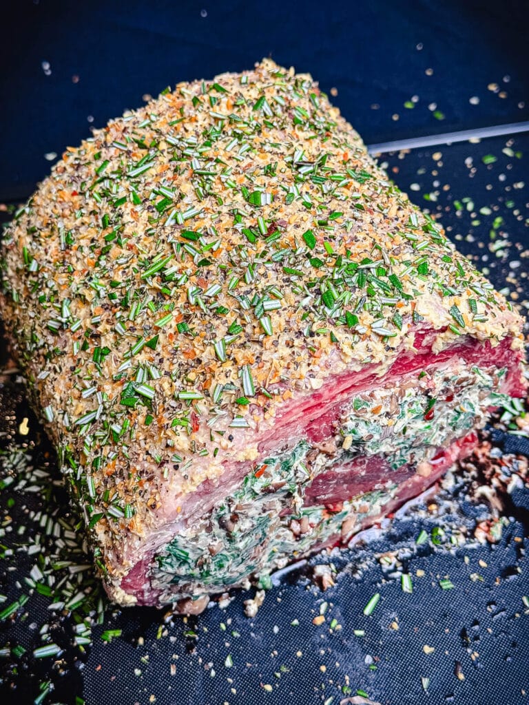 fresh chopped rosemary on a prime rib roast