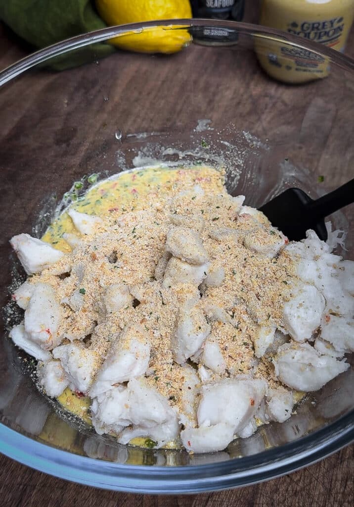 lump crab meat and panko in a bowl with binder