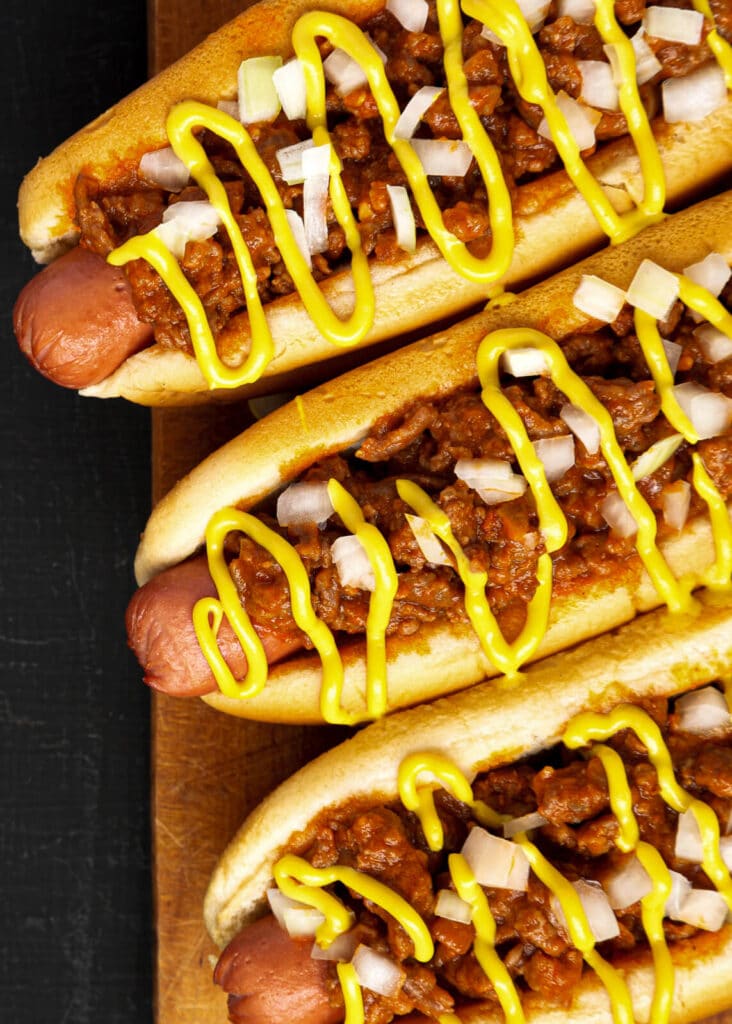 coney island dogs on a wooden tray