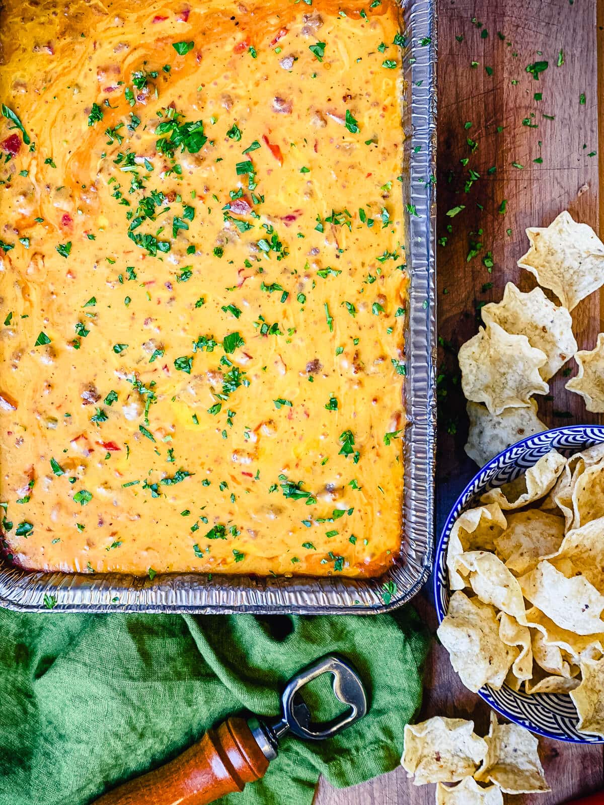 overhead shot of a pan of smoked queso dip